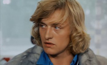 Movie still from “Turkish Delight” (1973), directed by Paul Verhoeven – A man's face with long blond hair; Close Up shot, Low angle