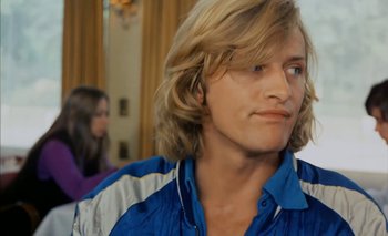 Movie still from “Turkish Delight” (1973), directed by Paul Verhoeven – A person with long blonde hair; Close Up shot, Over the shoulder angle