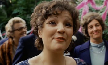 Movie still from “Turkish Delight” (1973), directed by Paul Verhoeven – A person wearing a dress; Close Up shot, High angle