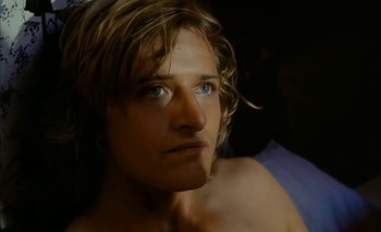 Movie still from “Turkish Delight” (1973), directed by Paul Verhoeven – A person with long blonde hair; Close Up shot, High angle