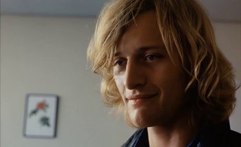 Movie still from “Turkish Delight” (1973), directed by Paul Verhoeven – A person with blonde hair; Close Up shot, Low angle