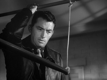 Movie still from “Twelve O'Clock High” (1949), directed by Henry King – Black and white photograph of a man in a leather jacket; Close Up shot, Low angle