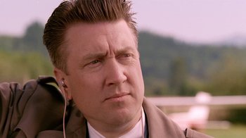 Movie still from “Twin Peaks: Fire Walk with Me” (1992), directed by David Lynch – A person wearing a jacket; Close Up shot, Low angle