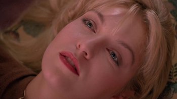 Movie still from “Twin Peaks: Fire Walk with Me” (1992), directed by David Lynch – A woman's eyes and lips; Close Up shot, Overhead angle