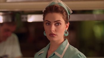 Movie still from “Twin Peaks: Fire Walk with Me” (1992), directed by David Lynch – A person wearing a uniform; Close Up shot, Low angle