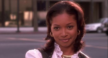 Movie still from “Two Can Play That Game” (2001), directed by Mark Brown – A person wearing a jacket; Close Up shot, Low angle