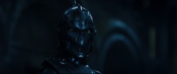 Movie still from “Underworld: Rise of the Lycans” (2009), directed by Patrick Tatopoulos – The face of a man wearing a black mask; Close Up shot, Low angle