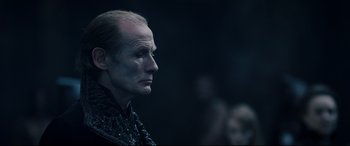 Movie still from “Underworld: Rise of the Lycans” (2009), directed by Patrick Tatopoulos – A person wearing a costume; Close Up shot, Over the shoulder angle