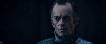 Movie still from “Underworld: Rise of the Lycans” (2009), directed by Patrick Tatopoulos – A person wearing a jacket; Close Up shot, Over the shoulder angle