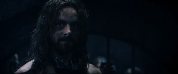Movie still from “Underworld: Rise of the Lycans” (2009), directed by Patrick Tatopoulos – A person with long hair; Close Up shot, Over the shoulder angle