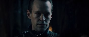 Movie still from “Underworld: Rise of the Lycans” (2009), directed by Patrick Tatopoulos – A person wearing a jacket; Close Up shot, Over the shoulder angle