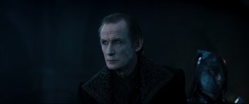 Movie still from “Underworld: Rise of the Lycans” (2009), directed by Patrick Tatopoulos – A person wearing a black jacket; Close Up shot, Over the shoulder angle