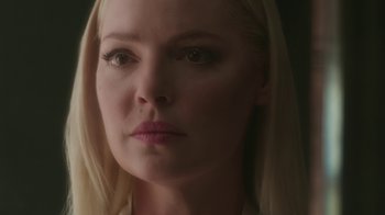 Movie still from “Unforgettable” (2017), directed by Denise Di Novi – A person with long blonde hair; Close Up shot, Over the shoulder angle