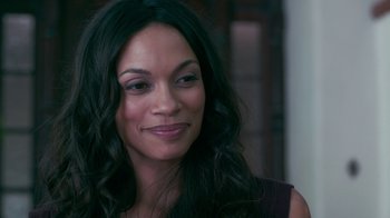 Movie still from “Unforgettable” (2017), directed by Denise Di Novi – A person with long black hair; Close Up shot, Over the shoulder angle