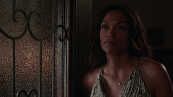 Movie still from “Unforgettable” (2017), directed by Denise Di Novi – A woman standing in front of a window looking to her left; Close Up shot, Over the shoulder angle