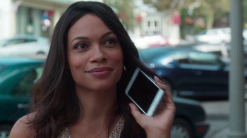 Movie still from “Unforgettable” (2017), directed by Denise Di Novi – A woman holding a cell phone up to her ear; Close Up shot, Over the shoulder angle