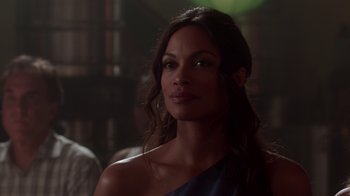 Movie still from “Unforgettable” (2017), directed by Denise Di Novi – A woman in a blue dress looking to her left; Close Up shot, Over the shoulder angle