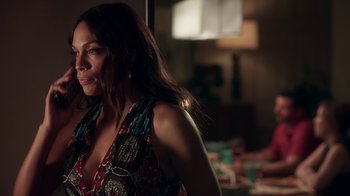 Movie still from “Unforgettable” (2017), directed by Denise Di Novi – A woman standing in front of a mirror in a room; Close Up shot, Over the shoulder angle