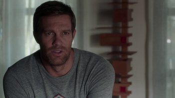 Movie still from “Unforgettable” (2017), directed by Denise Di Novi – A person sitting in a room; Close Up shot, Over the shoulder angle