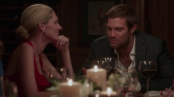 Movie still from “Unforgettable” (2017), directed by Denise Di Novi – A man and a woman sitting at a dinner table; Close Up shot, Over the shoulder angle