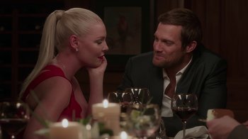 Movie still from “Unforgettable” (2017), directed by Denise Di Novi – A man and a woman sitting at a dinner table; Close Up shot, Over the shoulder angle