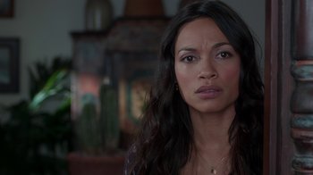 Movie still from “Unforgettable” (2017), directed by Denise Di Novi – A person with long black hair; Close Up shot, Over the shoulder angle