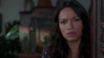 Movie still from “Unforgettable” (2017), directed by Denise Di Novi – A person with long black hair; Close Up shot, Over the shoulder angle