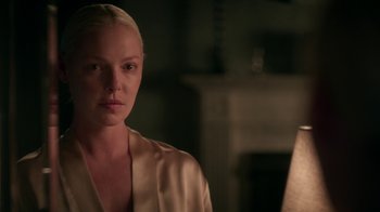 Movie still from “Unforgettable” (2017), directed by Denise Di Novi – A woman in a white robe looking at the camera; Close Up shot, Over the shoulder angle