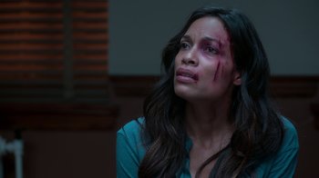Movie still from “Unforgettable” (2017), directed by Denise Di Novi – A woman with a bruised face looking to her left; Close Up shot, Over the shoulder angle