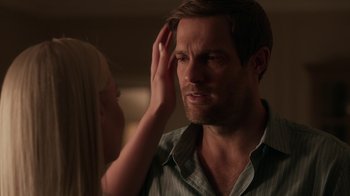 Movie still from “Unforgettable” (2017), directed by Denise Di Novi – A man and a woman looking at each other; Close Up shot, Over the shoulder angle