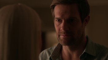 Movie still from “Unforgettable” (2017), directed by Denise Di Novi – A person wearing a shirt; Close Up shot, Over the shoulder angle