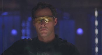 Movie still from “Universal Soldier: The Return” (1999), directed by Mic Rodgers – A person wearing goggles; Close Up shot, Low angle