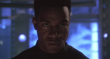 Movie still from “Universal Soldier: The Return” (1999), directed by Mic Rodgers – A person with a nose ring; Close Up shot, Low angle