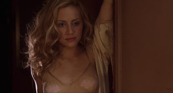 Movie still from “Uptown Girls” (2003), directed by Boaz Yakin – A beautiful young woman in a pink and beige lingerie; Close Up shot, Low angle