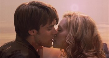Movie still from “Uptown Girls” (2003), directed by Boaz Yakin – A man and a woman kissing each other; Close Up shot, Low angle