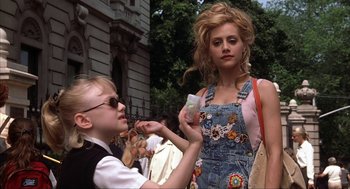 Movie still from “Uptown Girls” (2003), directed by Boaz Yakin – A young girl and an older woman are standing together; Medium shot, Low angle