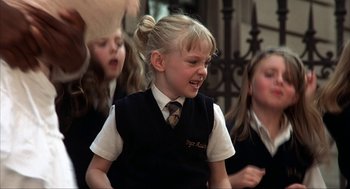 Movie still from “Uptown Girls” (2003), directed by Boaz Yakin – A group of young girls wearing school uniforms; Medium shot, Low angle
