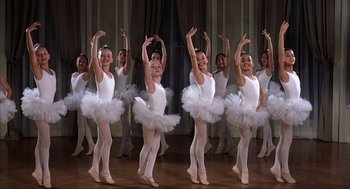 Movie still from “Uptown Girls” (2003), directed by Boaz Yakin – A group of young ballerinas performing a dance routine; Wide shot, Low angle