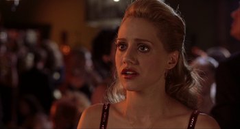 Movie still from “Uptown Girls” (2003), directed by Boaz Yakin – A person wearing a dress; Close Up shot, Over the shoulder angle