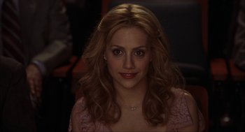 Movie still from “Uptown Girls” (2003), directed by Boaz Yakin – A person with long hair; Close Up shot, High angle