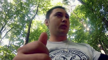 Movie still from “V/H/S/2” (2013), directed by Timo Tjahjanto – A person holding a thumbs up; Close Up shot, Low angle