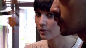 Movie still from “V/H/S/2” (2013), directed by Timo Tjahjanto – A man and a woman looking at one another; Extreme Close Up shot, Over the shoulder angle