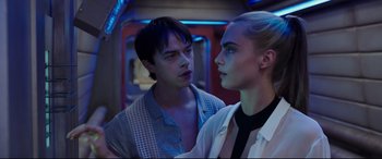 Movie still from “Valerian and the City of a Thousand Planets” (2017), directed by Luc Besson – A man and a woman standing next to each other; Close Up shot, Over the shoulder angle