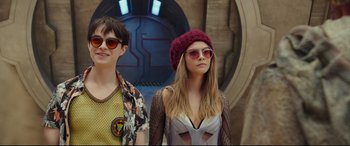 Movie still from “Valerian and the City of a Thousand Planets” (2017), directed by Luc Besson – A man and a woman standing next to each other; Medium shot, Over the shoulder angle