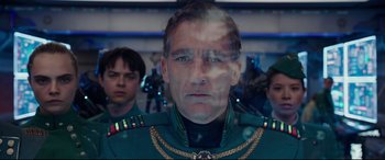 Movie still from “Valerian and the City of a Thousand Planets” (2017), directed by Luc Besson – A person wearing a uniform; Close Up shot, Low angle