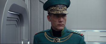 Movie still from “Valerian and the City of a Thousand Planets” (2017), directed by Luc Besson – A person wearing a uniform; Close Up shot, Low angle