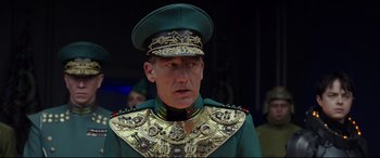 Movie still from “Valerian and the City of a Thousand Planets” (2017), directed by Luc Besson – A person wearing a military uniform; Close Up shot, Low angle