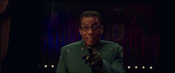 Movie still from “Valerian and the City of a Thousand Planets” (2017), directed by Luc Besson – A man in a green jacket is pointing at the camera; Close Up shot, Low angle