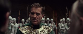 Movie still from “Valerian and the City of a Thousand Planets” (2017), directed by Luc Besson – A person wearing a uniform; Close Up shot, Over the shoulder angle