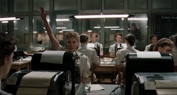 Movie still from “Valkyrie” (2008), directed by Bryan Singer – A group of people sitting at a table in a room; Medium shot, Low angle